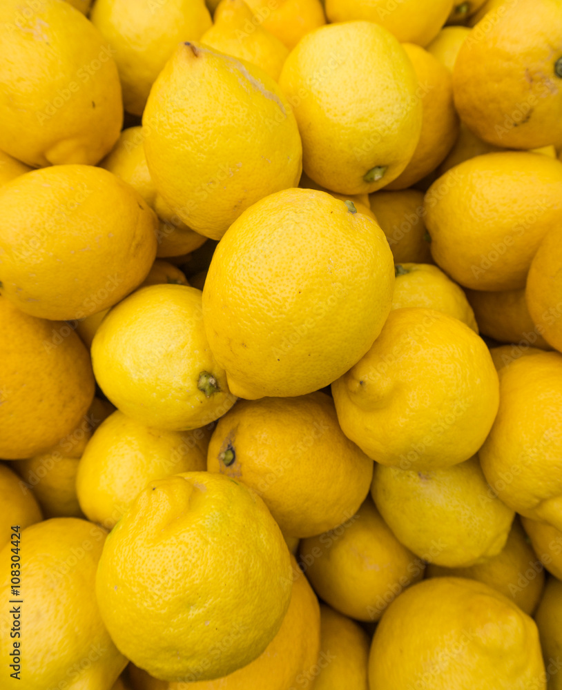 yellow lemons textures backgrounds. Group of fresh lemons. yellow lemons textures backgrounds. Group of fresh lemons.