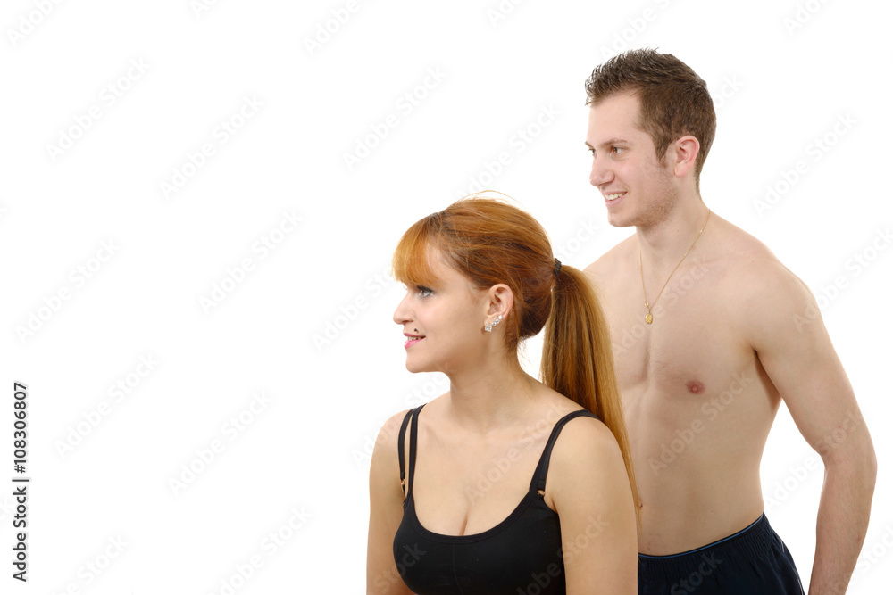 Beautiful young woman and man doing stretching exercises Beautiful young woman and man doing stretching exercises