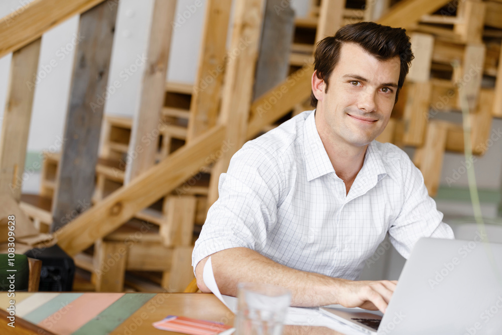Fototapeta premium Young businessman in office