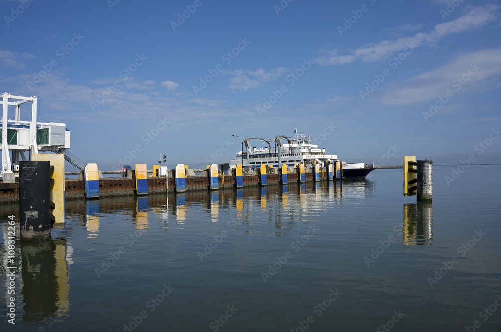 Naklejka premium Car ferry docking at a Delaware Bay destination.
