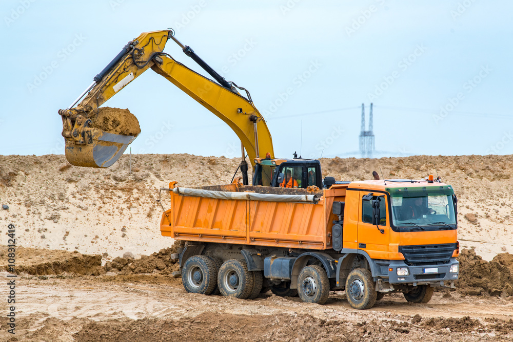 Excavator working on the construction site Excavator working on the construction site