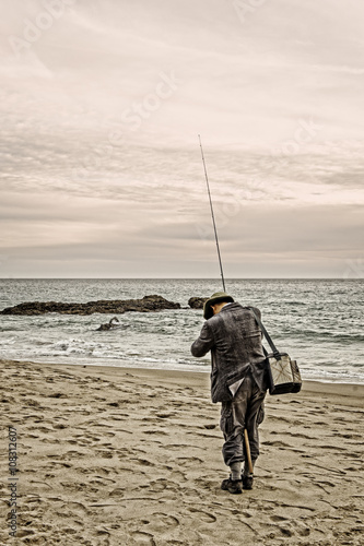 Angler at the beach california