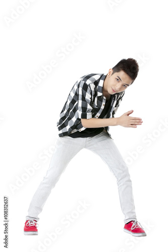 teenager guy gesturing a pose © Dan Kosmayer
