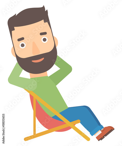 Man sitting in a folding chair.