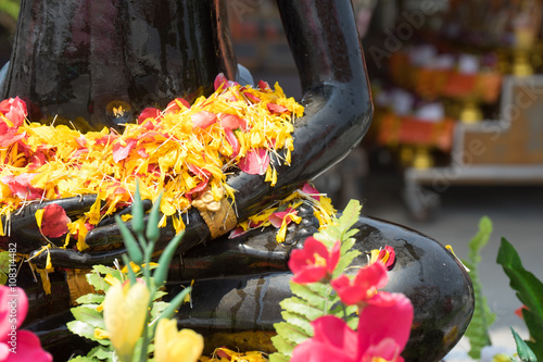 Buddha with flowers that lap