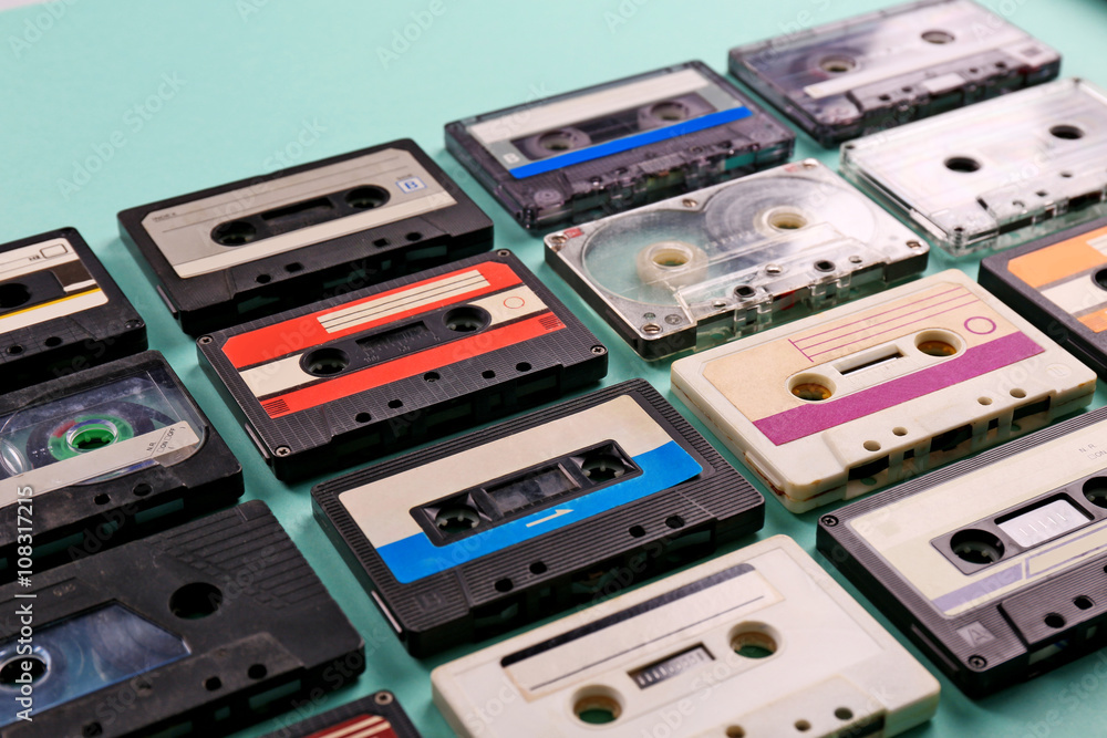 Obraz premium Set of old audio cassettes on blue background