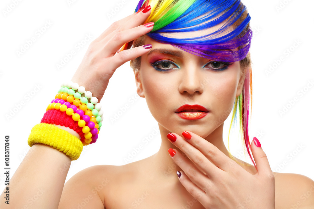 Naklejka premium Beautiful girl with colorful makeup, manicure and hairstyle on white background