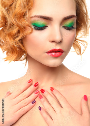 Beautiful girl with colorful makeup  manicure  close up