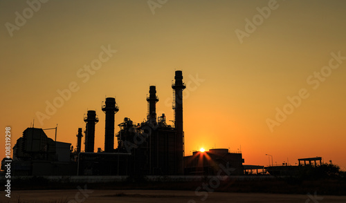 Gas turbine electrical power plant with sunset © mathisa