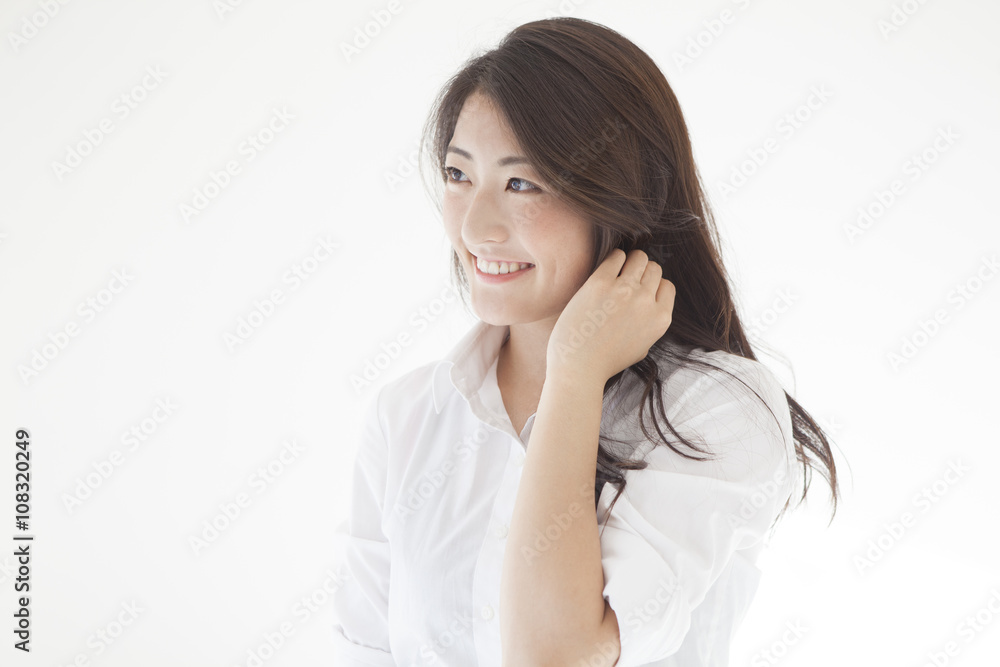 Young women are touching the long hair Young women are touching the long hair