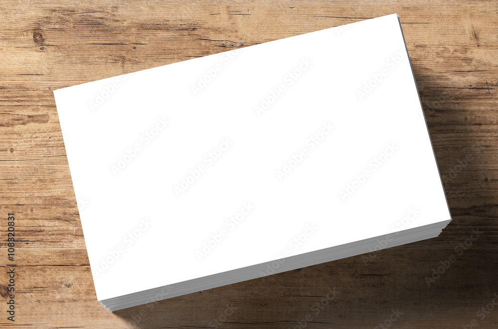stack of white blank name card on wooden background