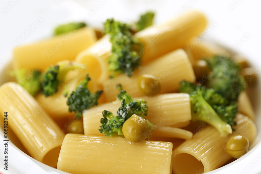 Plate of pasta with broccoli closeup Plate of pasta with broccoli closeup