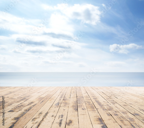 Wooden pier  exotic sea and a blue sky