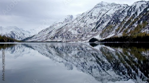 Lower Multinskoe lake in the Altai Mountains in cloudy weather. photo