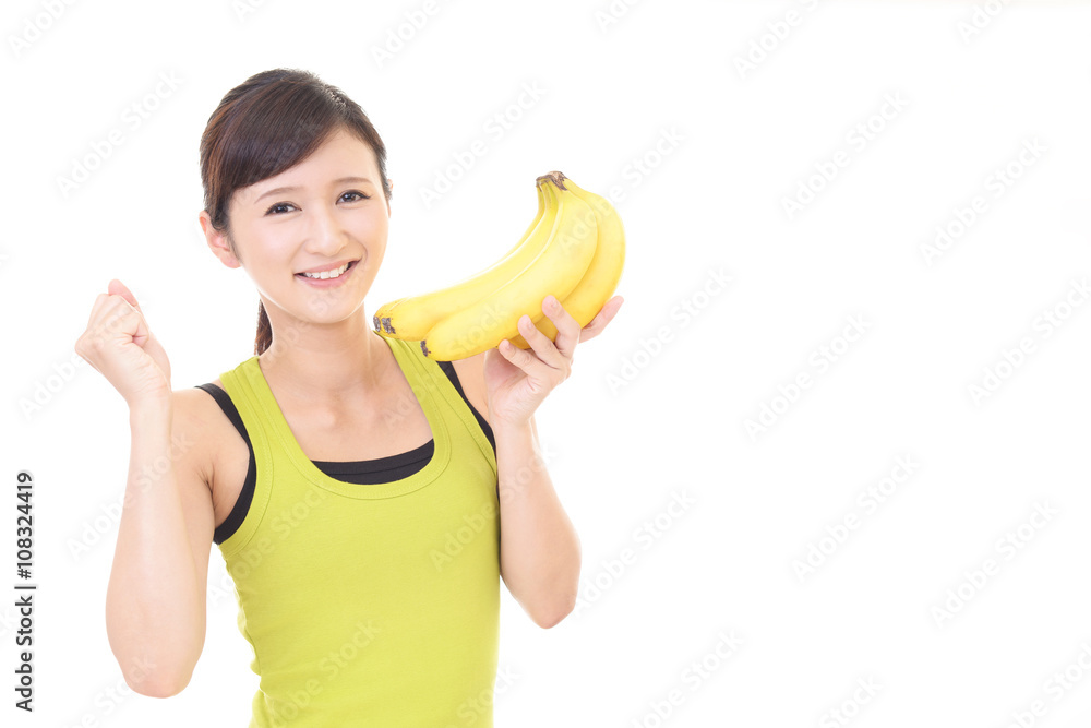 バナナを持つ女性