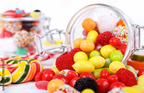 many different colorful candies and chewing gum