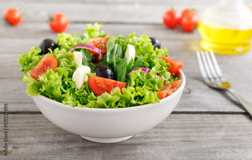 fresh vegetable salad with mozzarella