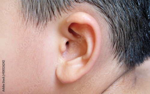 ear wall at entrance to inner ear with water drops of asian boy