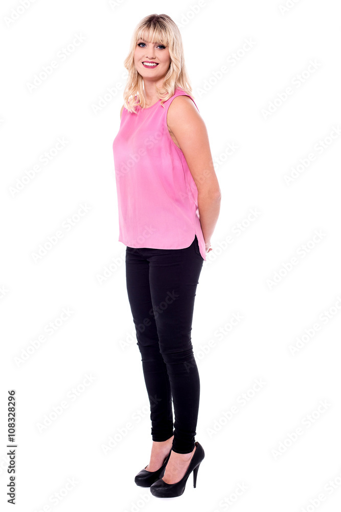 Studio shot of jovial lady in denims Studio shot of jovial lady in denims