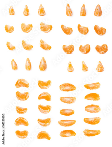 Slice sections of tangerine isolated over the white background