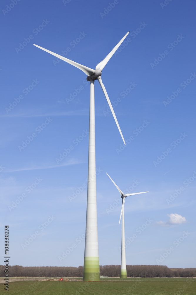 wind turbines in the dutch province of flevoland with blue sky wind turbines in the dutch province of flevoland with blue sky