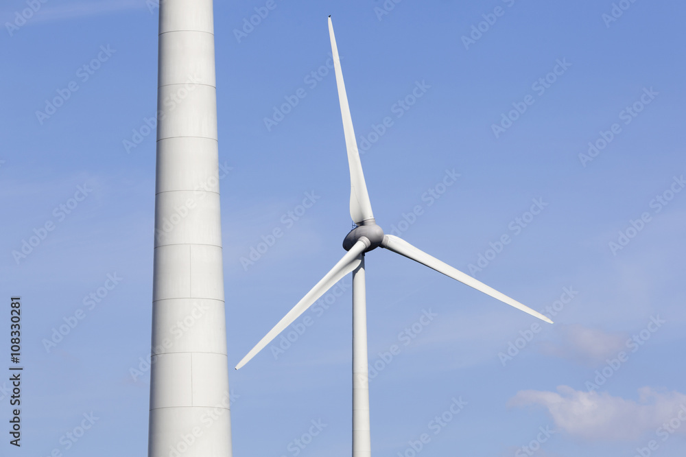 wind turbines in the dutch province of flevoland with blue sky wind turbines in the dutch province of flevoland with blue sky