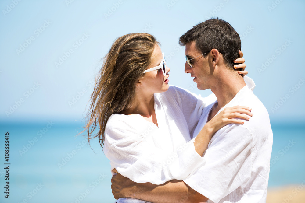 Happy couple on the beach