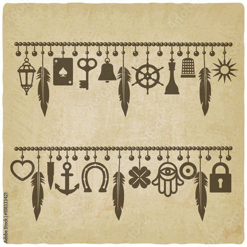 charm bracelets with symbols of good luck old background