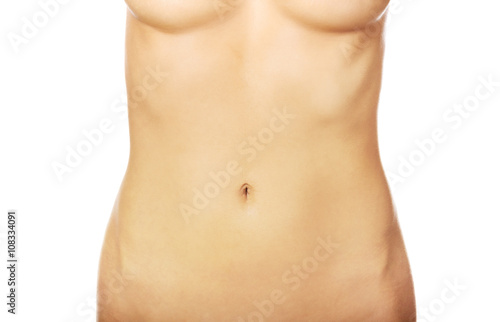Beautiful nude slim woman's belly 
