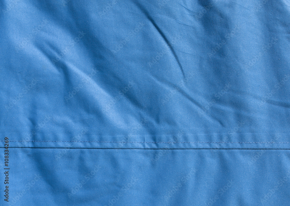 Naklejka premium Blue textile texture close-up.