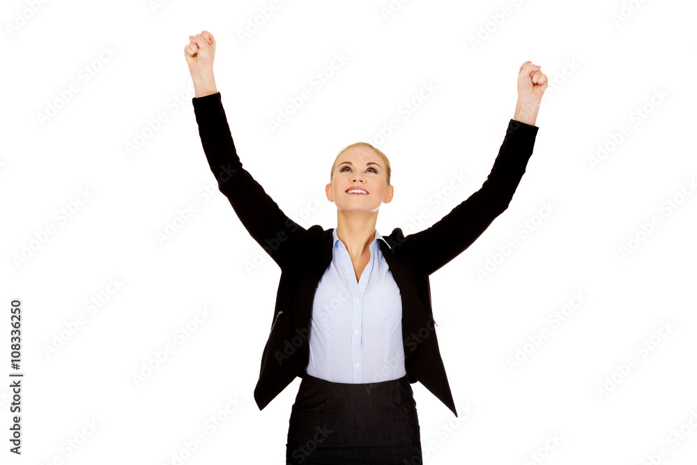 Young happy business woman with arms up Young happy business woman with arms up