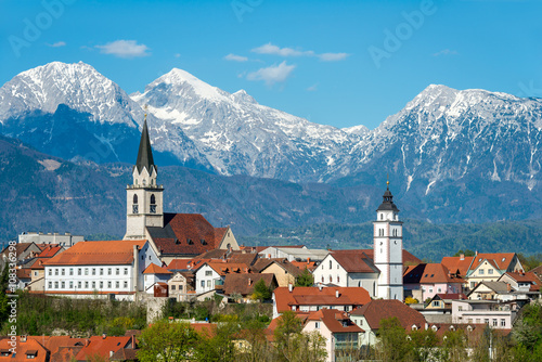 Panorama of Kranj, Slovenia, Europe. Kranj in Slovenia with St. Cantianus Church in the foreground and the Kamnik Alps behind. photo