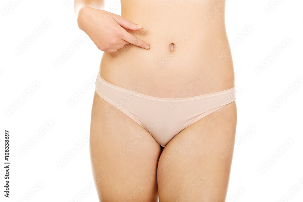 Young woman pointing for her belly