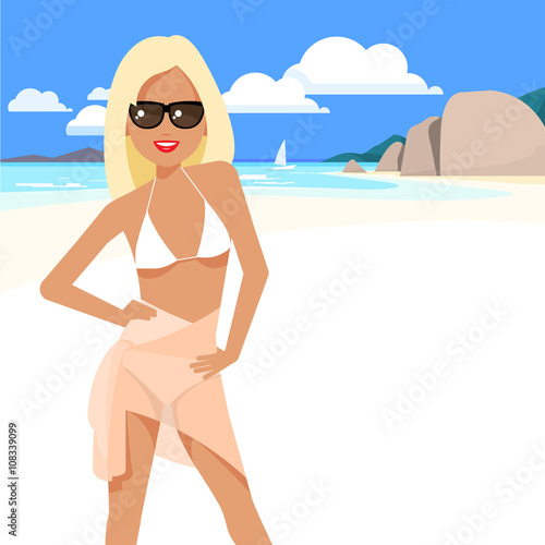Cute girl in a bikini and pareo on the beach.