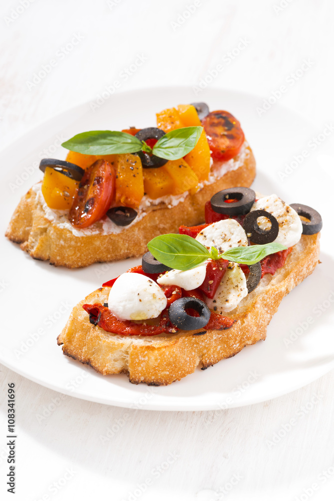 italian appetizer - bruschetta on plate, vertical italian appetizer - bruschetta on plate, vertical