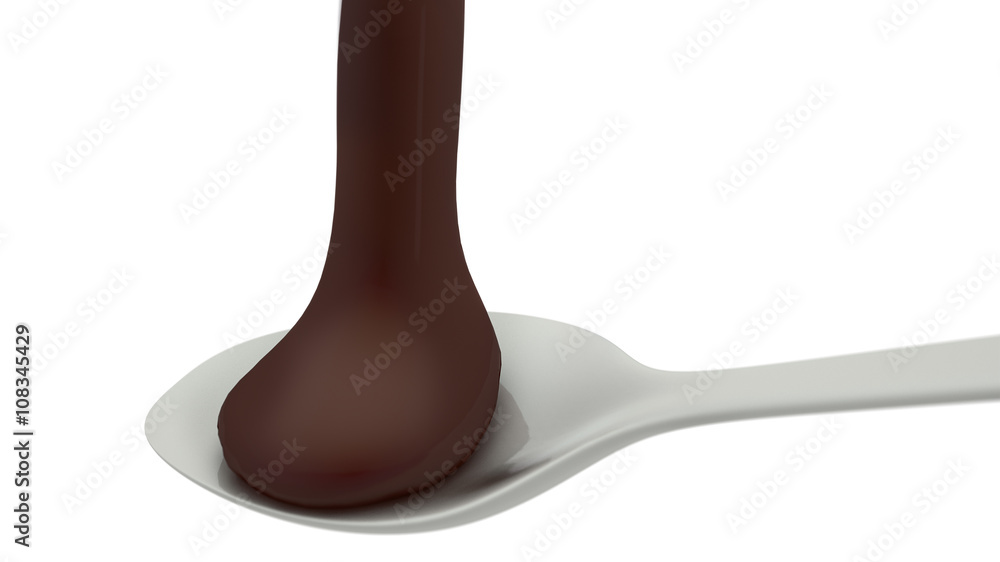 Chocolate poured on a metal spoon Chocolate poured on a metal spoon