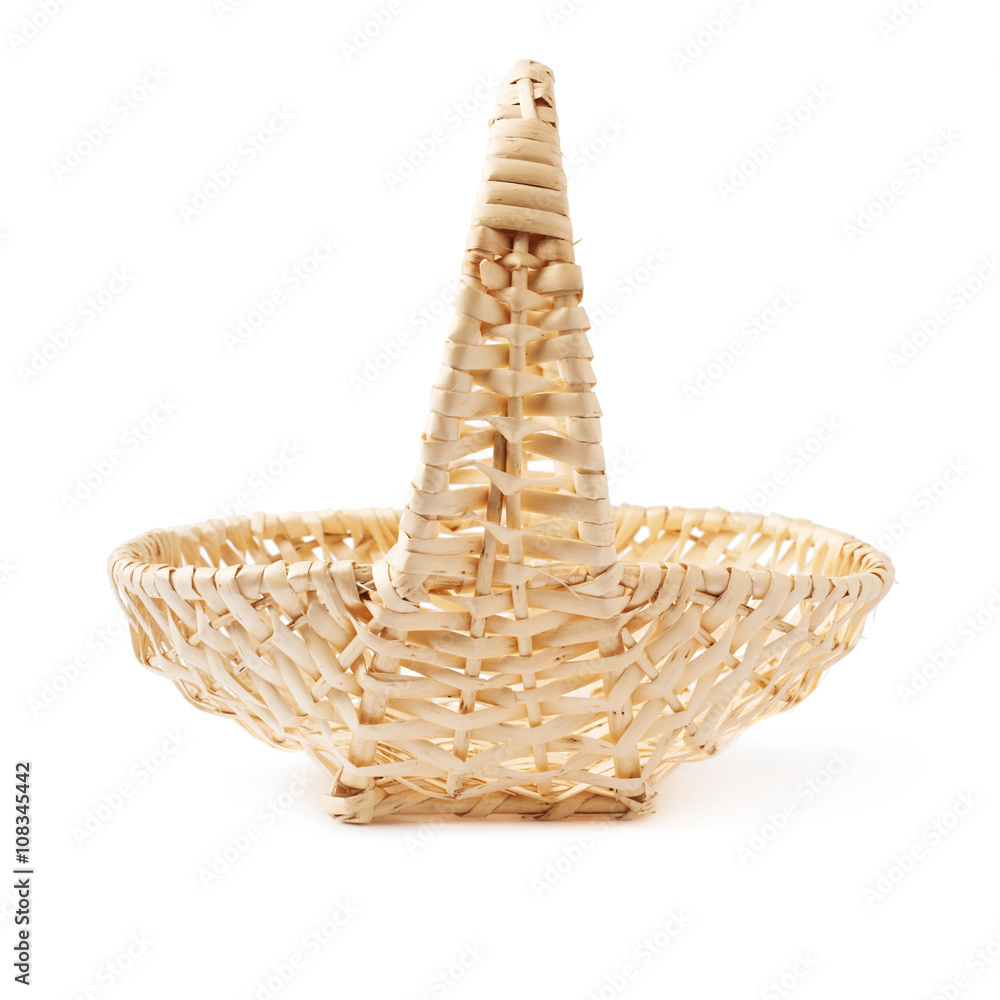 Obraz premium Brown wicker basket isolated over the white background