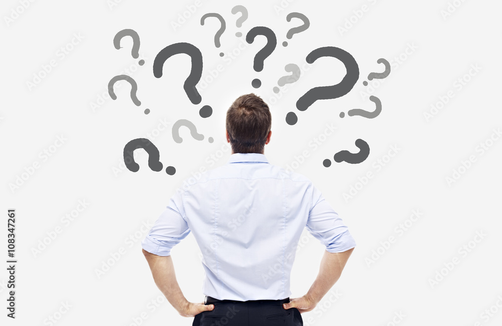 businessman looking at writings on white board businessman looking at writings on white board