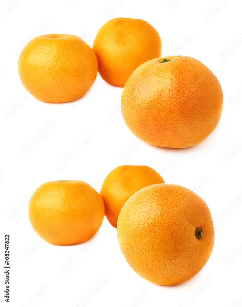 Pile of multiple fresh juicy grapefruits, isolated over the white background Pile of multiple fresh juicy grapefruits, isolated over the white background