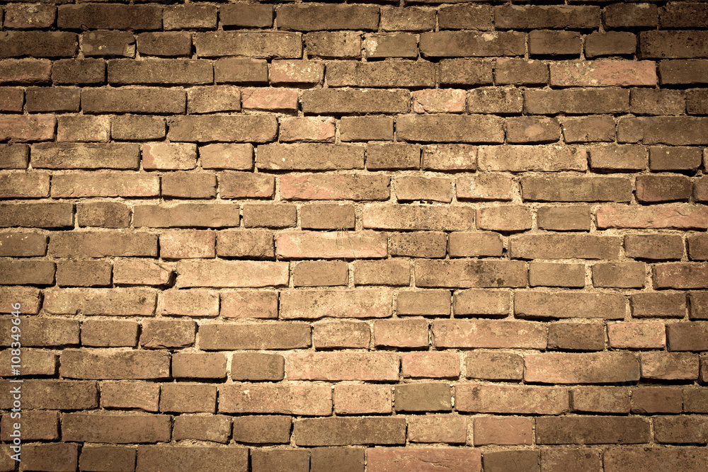 Obraz premium brown - orange retro brick wall - background texture