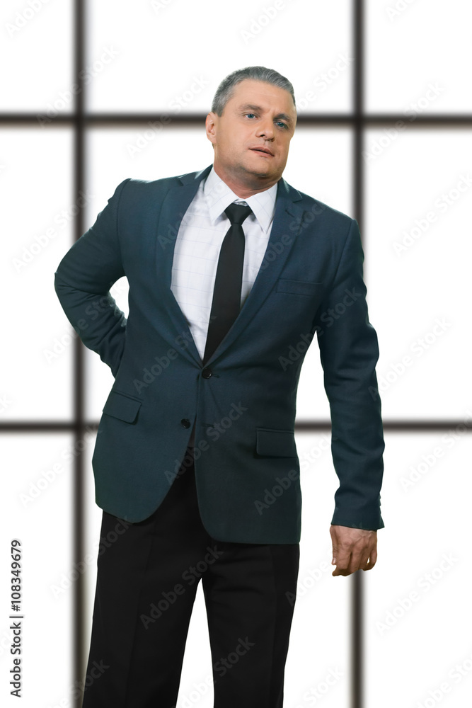 Adult businessman having back pain. Diseased manager on white background. Serious kidney injury. Problem that needs treatment. Adult businessman having back pain. Diseased manager on white background. Serious kidney injury. Problem that needs treatment.