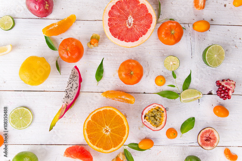 Citrus fruits on a wooden table.