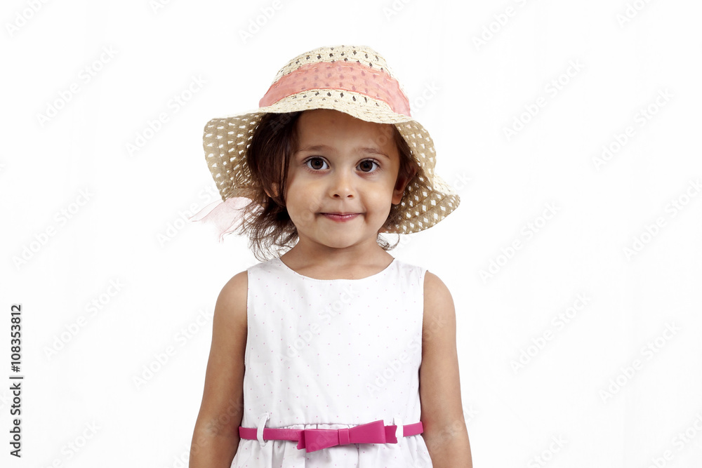 Girl wearing a summer dress and a hat isolated on white background Girl wearing a summer dress and a hat isolated on white background