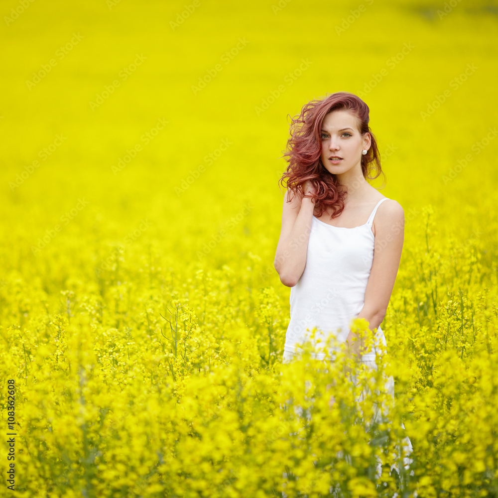 young beautiful girl in yellow field young beautiful girl in yellow field