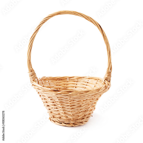 Brown wicker basket isolated over the white background