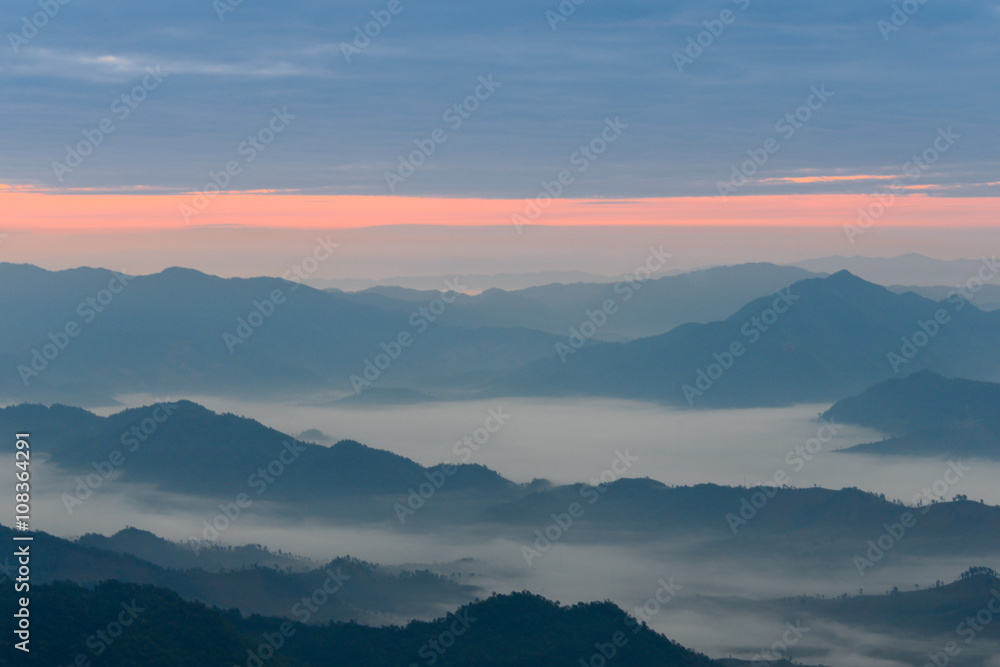 Sunrise and mist Phu Chi Fa.


