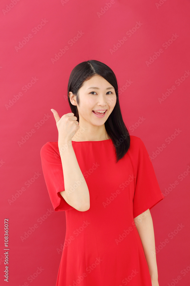 サムズアップ・若い女性 サムズアップ・若い女性