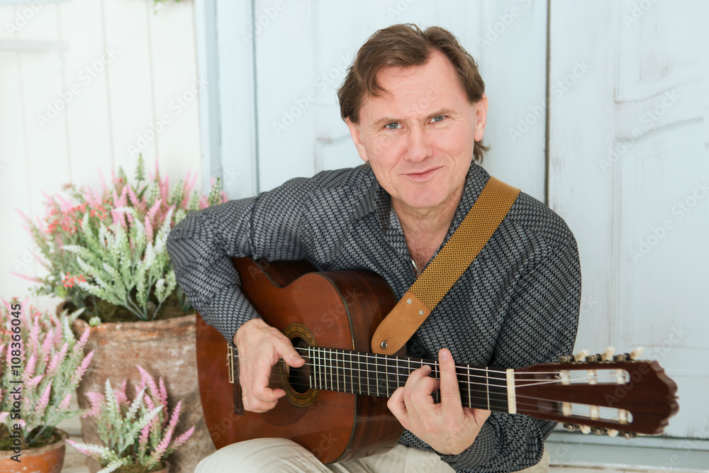 Obraz premium Man playing the guitar 