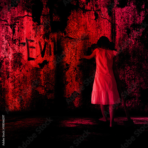 Mysterious Girl in White Dress Dragging an Axe in Abandon Building,Horror Background For Halloween Concept and Book Cover Ideas