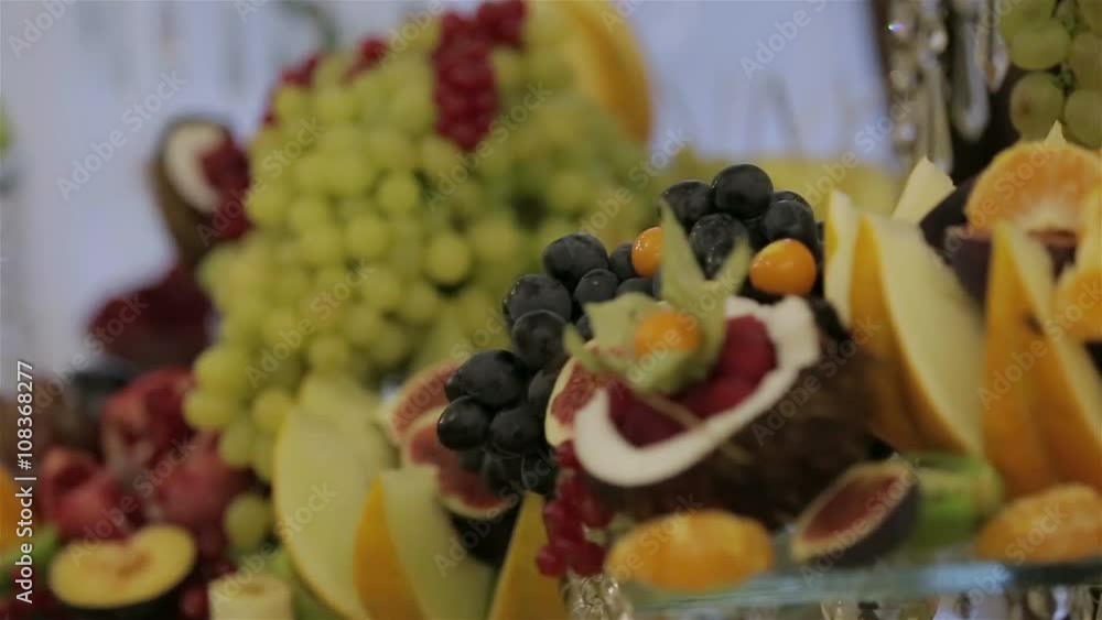 Decorative festive table with fruit. Decorative festive table with fruit.